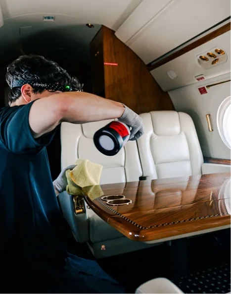 Aircraft Detailing Phoenix Arizona – Certified aircraft detailing specialist preparing cleaning equipment inside private aircraft in Phoenix Arizona